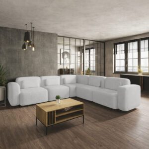 Duży narożnik wieloosobowy w kolorze białym, ustawiony w stylowej aranżacji wnętrza. Przykład, jak dopasować kolor do salonu.