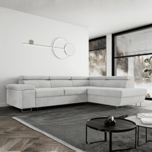 Narożnik Milano w jasnym szarym kolorze, ustawiony w stylowej aranżacji wnętrza. Przykład, jak dopasować kolor do salonu.