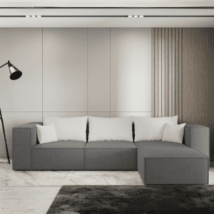 Sofa 3-osobowa z pufą w ciemnym odcieniu szarości, widok z przodu w aranżacji salonu. Zdjęcie ukazuje spójny, elegancki zestaw.