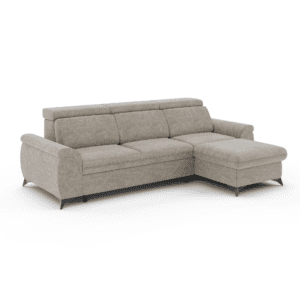 Sofa narożna Montana 2 beżowy, sfotografowany pod kątem. Prezentacja detali i bryły mebla.