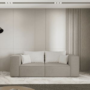 Beżowa sofa dwuosobowa w narożnej wersji, widok od frontu w domowym wnętrzu. Zdjęcie inspiracyjne z naciskiem na przytulny klimat.