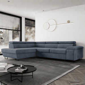 Narożnik Milano w kolorze granatowy, ustawiony w stylowej aranżacji wnętrza. Przykład, jak dopasować kolor do salonu.